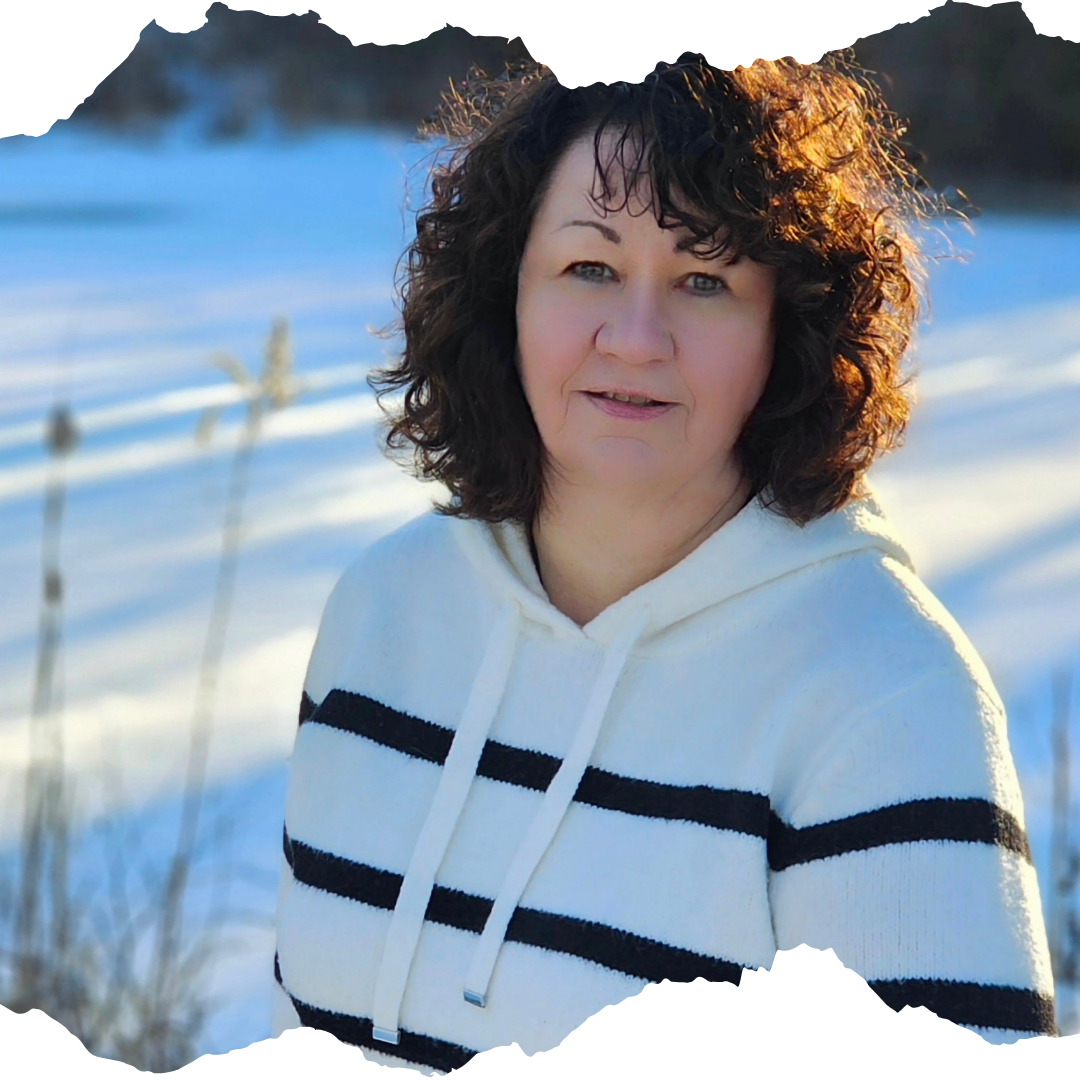 Profile photo of Lisa Tussey, headshot outside in winter with snow